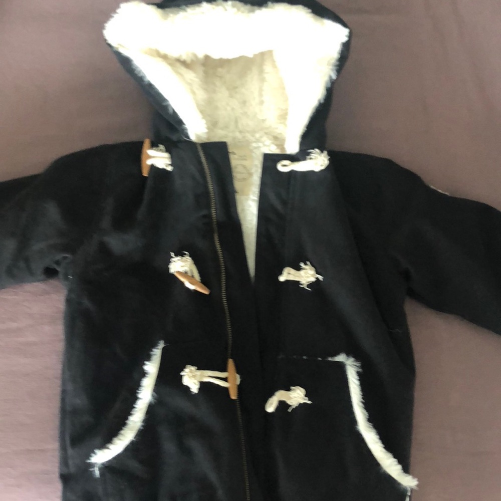 Barely worn  Black with faux fur interior lining girls jacket